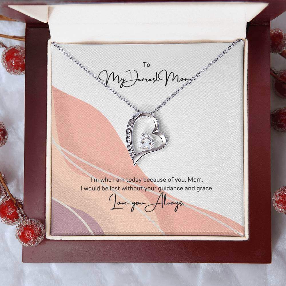 To My Dearest Mom, I am who I am - Love Knot Necklace"Mom, your guidance made me who I am. The Forever Love Necklace with a 6.5mm CZ crystal in a heart pendant is a symbol of my love."Moving Phrases