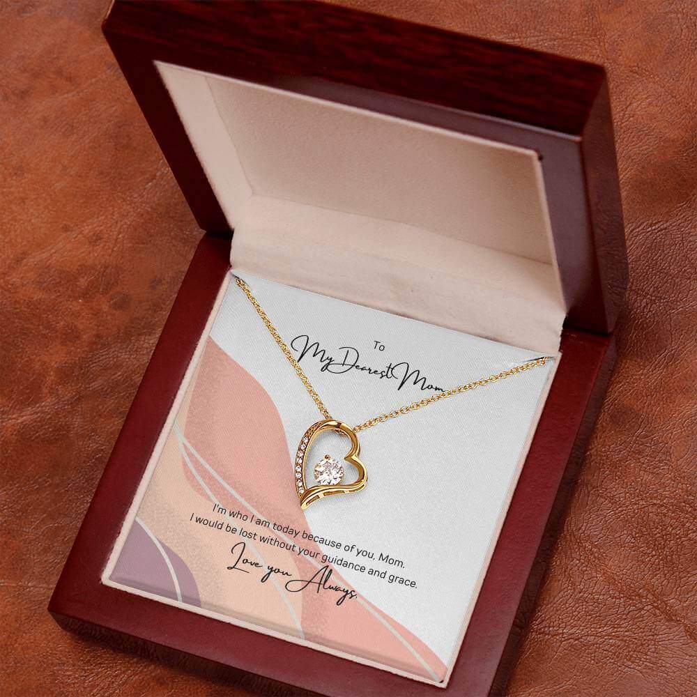 To My Dearest Mom, I am who I am - Love Knot Necklace"Mom, your guidance made me who I am. The Forever Love Necklace with a 6.5mm CZ crystal in a heart pendant is a symbol of my love."Moving Phrases