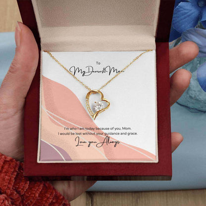 To My Dearest Mom, I am who I am - Love Knot Necklace"Mom, your guidance made me who I am. The Forever Love Necklace with a 6.5mm CZ crystal in a heart pendant is a symbol of my love."Moving Phrases