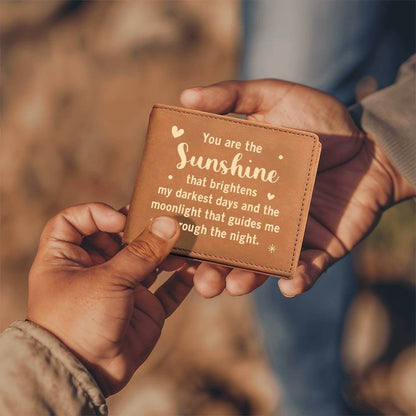 You are the Sunshine - Graphic Leather WalletGift a quality Graphic Leather Wallet! Made from full grain cowhide, it ages beautifully. Comes in a stylish gift box.Moving Phrases