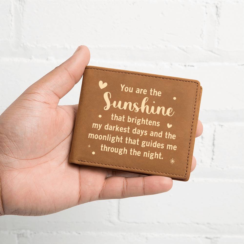 You are the Sunshine - Graphic Leather WalletGift a quality Graphic Leather Wallet! Made from full grain cowhide, it ages beautifully. Comes in a stylish gift box.Moving Phrases