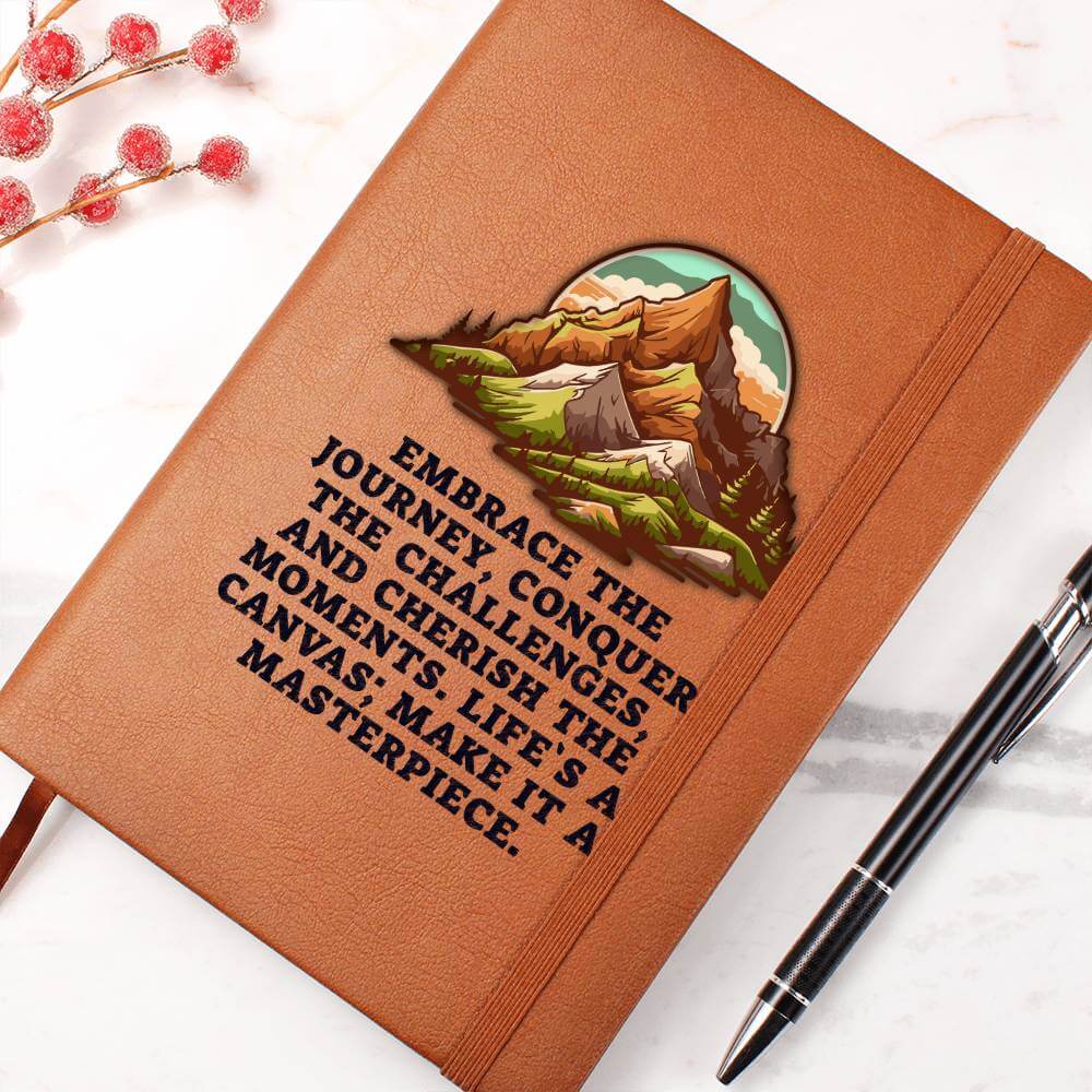 Embrace the journey - Graphic Leather JournalVenture beyond with the Graphic Leather Journal. Ideal for goal setting and organization, it features a bookmark and elastic closure.Moving Phrases