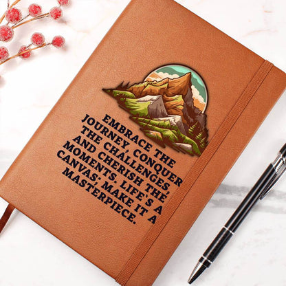 Embrace the journey - Graphic Leather JournalVenture beyond with the Graphic Leather Journal. Ideal for goal setting and organization, it features a bookmark and elastic closure.Moving Phrases