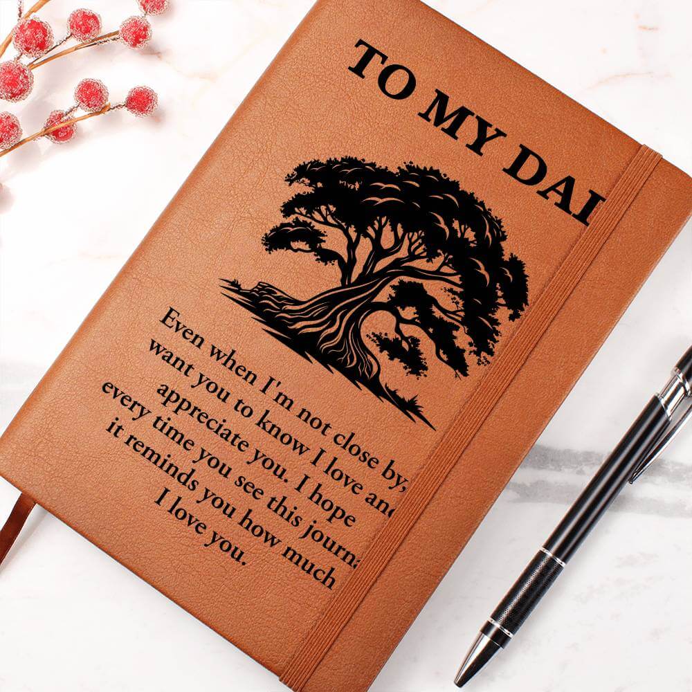 To My Dad, Even when I'm not close - Graphic Leather JournalVenture beyond with the Graphic Leather Journal. Ideal for goal setting and organization, it features a bookmark and elastic closure.Moving Phrases