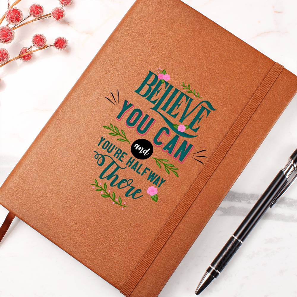 Believe you can - Graphic Leather JournalVenture beyond with the Graphic Leather Journal. Ideal for goal setting and organization, it features a bookmark and elastic closure.Moving Phrases