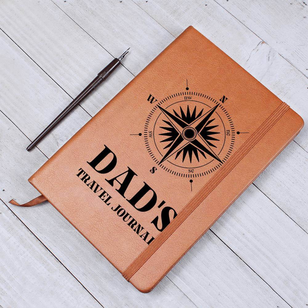 Dad's Travel Journal - Graphic Leather JournalVenture beyond with the Graphic Leather Journal. Ideal for goal setting and organization, it features a bookmark and elastic closure.Moving Phrases