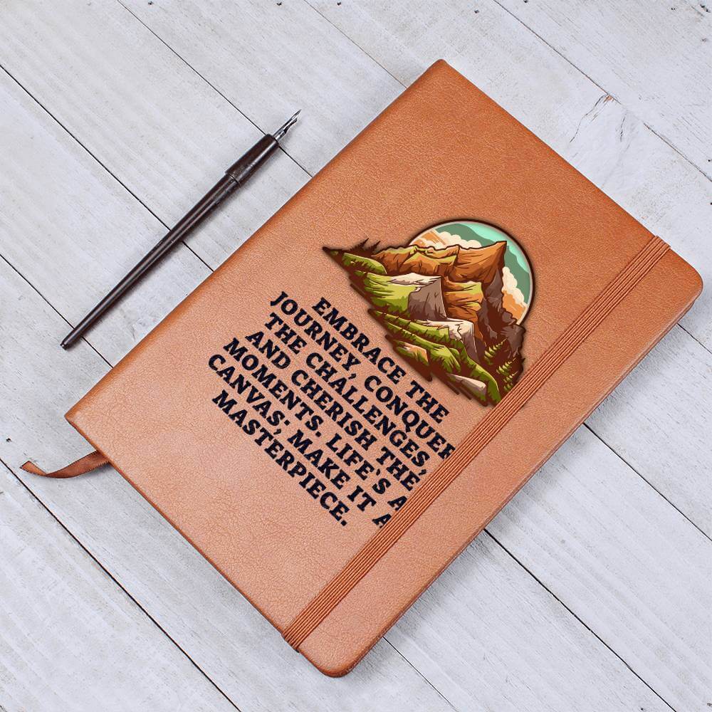 Embrace the journey - Graphic Leather JournalVenture beyond with the Graphic Leather Journal. Ideal for goal setting and organization, it features a bookmark and elastic closure.Moving Phrases