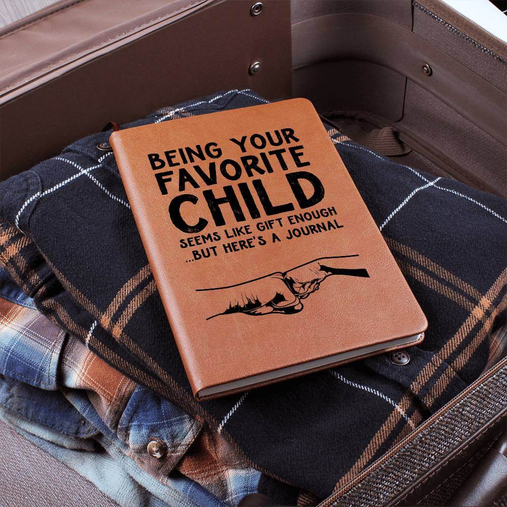 Being your favorite child seems - Graphic Leather JournalVenture beyond with the Graphic Leather Journal. Ideal for goal setting and organization, it features a bookmark and elastic closure.Moving Phrases