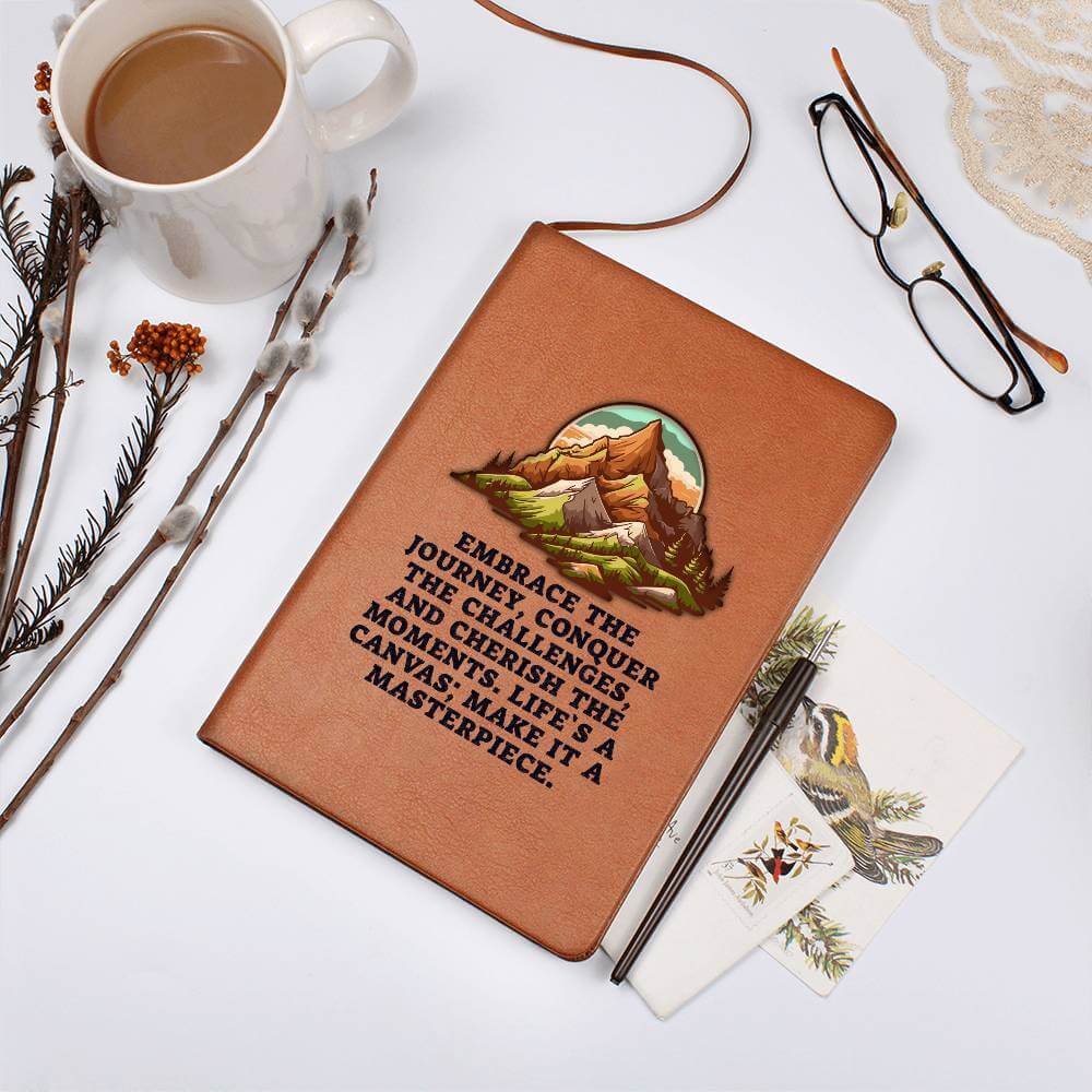 Embrace the journey - Graphic Leather JournalVenture beyond with the Graphic Leather Journal. Ideal for goal setting and organization, it features a bookmark and elastic closure.Moving Phrases