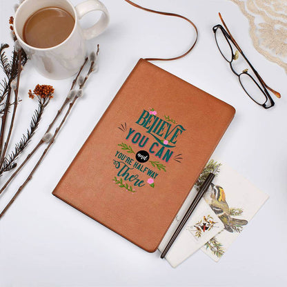 Believe you can - Graphic Leather JournalVenture beyond with the Graphic Leather Journal. Ideal for goal setting and organization, it features a bookmark and elastic closure.Moving Phrases