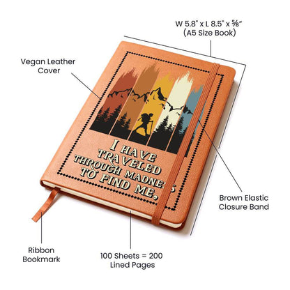 I have traveled through madness - Graphic Leather JournalVenture beyond with the Graphic Leather Journal. Ideal for goal setting and organization, it features a bookmark and elastic closure.Moving Phrases