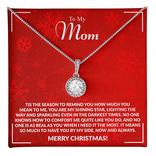 "To My Mom Christmas card and necklace gift featuring heartfelt message with snowflake design on red background."