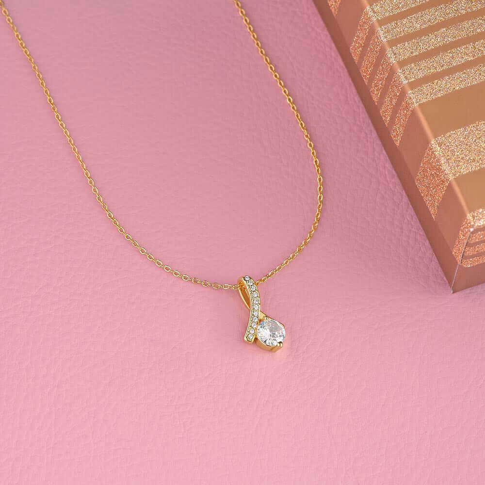 To Mom, Happy Mother's Day - Alluring Beauty NecklaceMother's Day gift: an Alluring Beauty necklace with a petite ribbon pendant to show love and appreciation to mom.Moving Phrases