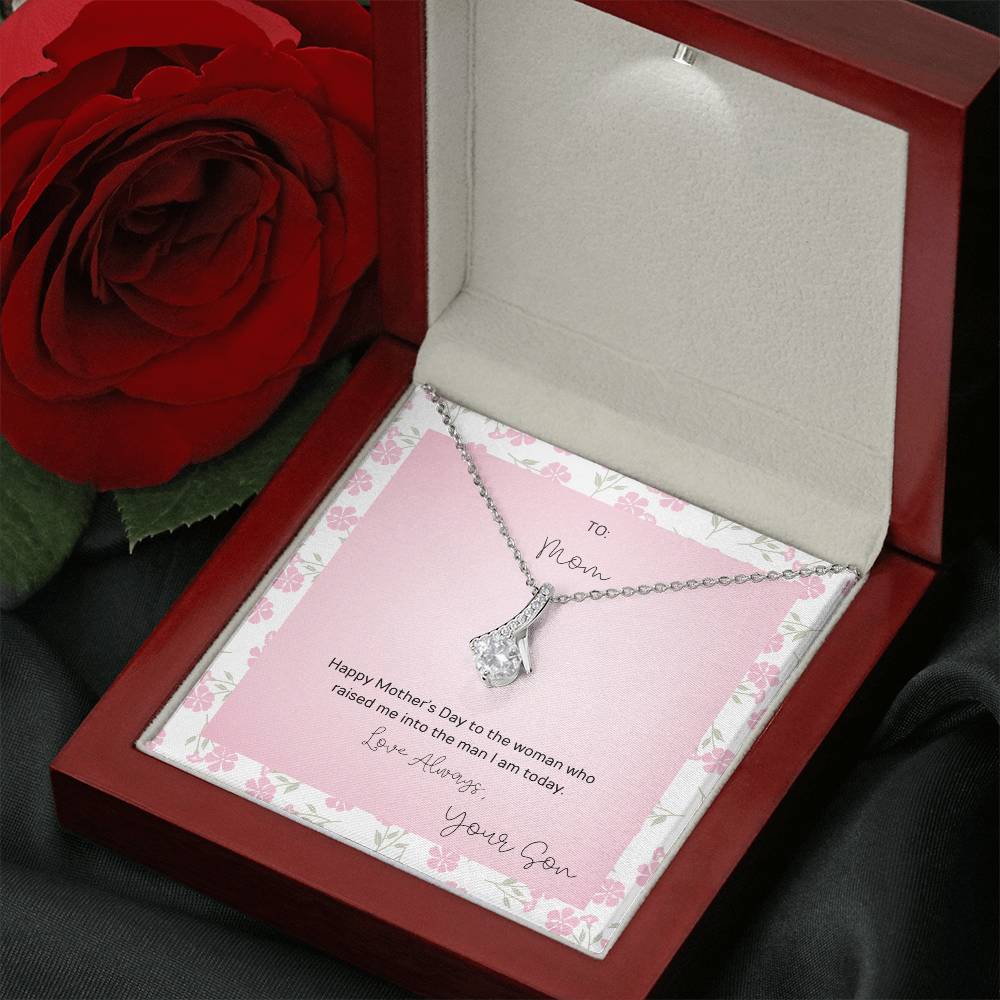 To Mom, Happy Mother's Day - Alluring Beauty NecklaceMother's Day gift: an Alluring Beauty necklace with a petite ribbon pendant to show love and appreciation to mom.Moving Phrases