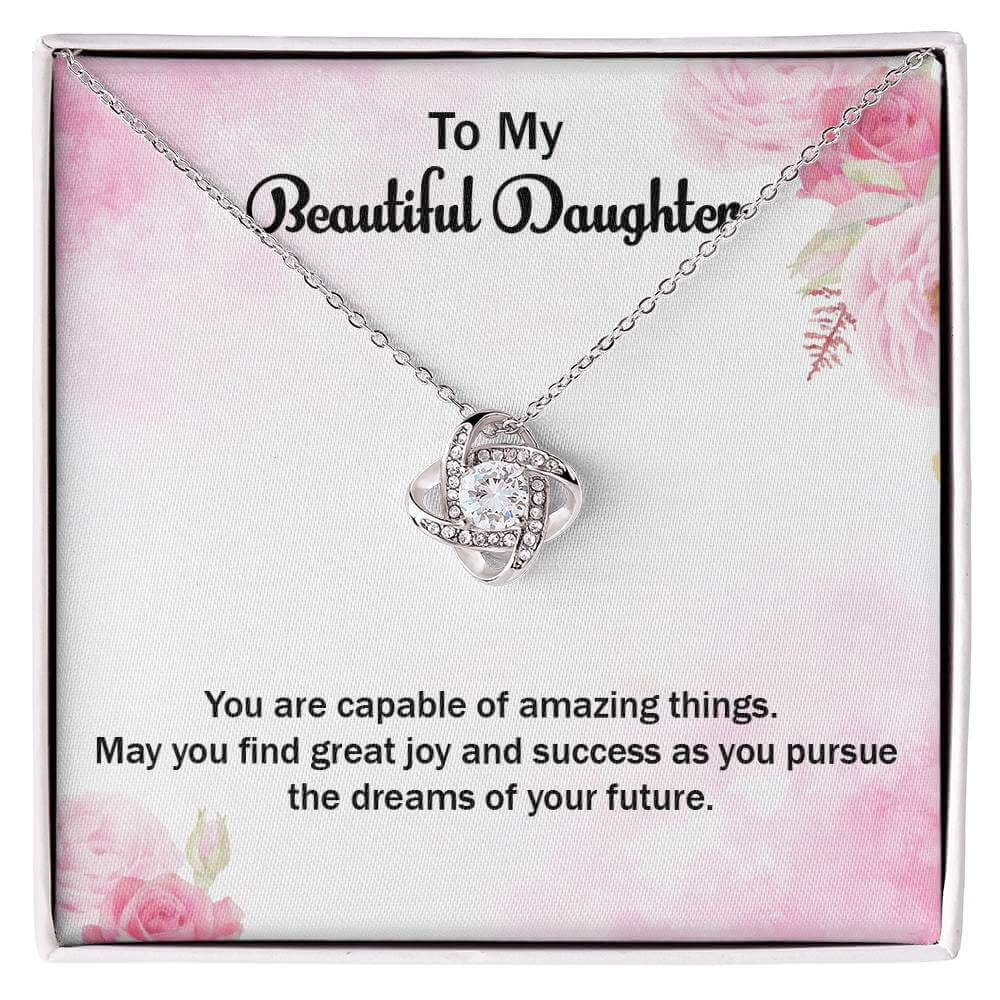 Love Knot Necklace - Perfect Gift for Your DaughterSurprise her with a Love Knot Necklace, a symbol of love & success. Ideal for your amazing daughter. Shop now for a heartfelt gift!Moving Phrases