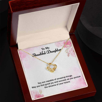 Love Knot Necklace - Perfect Gift for Your DaughterSurprise her with a Love Knot Necklace, a symbol of love & success. Ideal for your amazing daughter. Shop now for a heartfelt gift!Moving Phrases