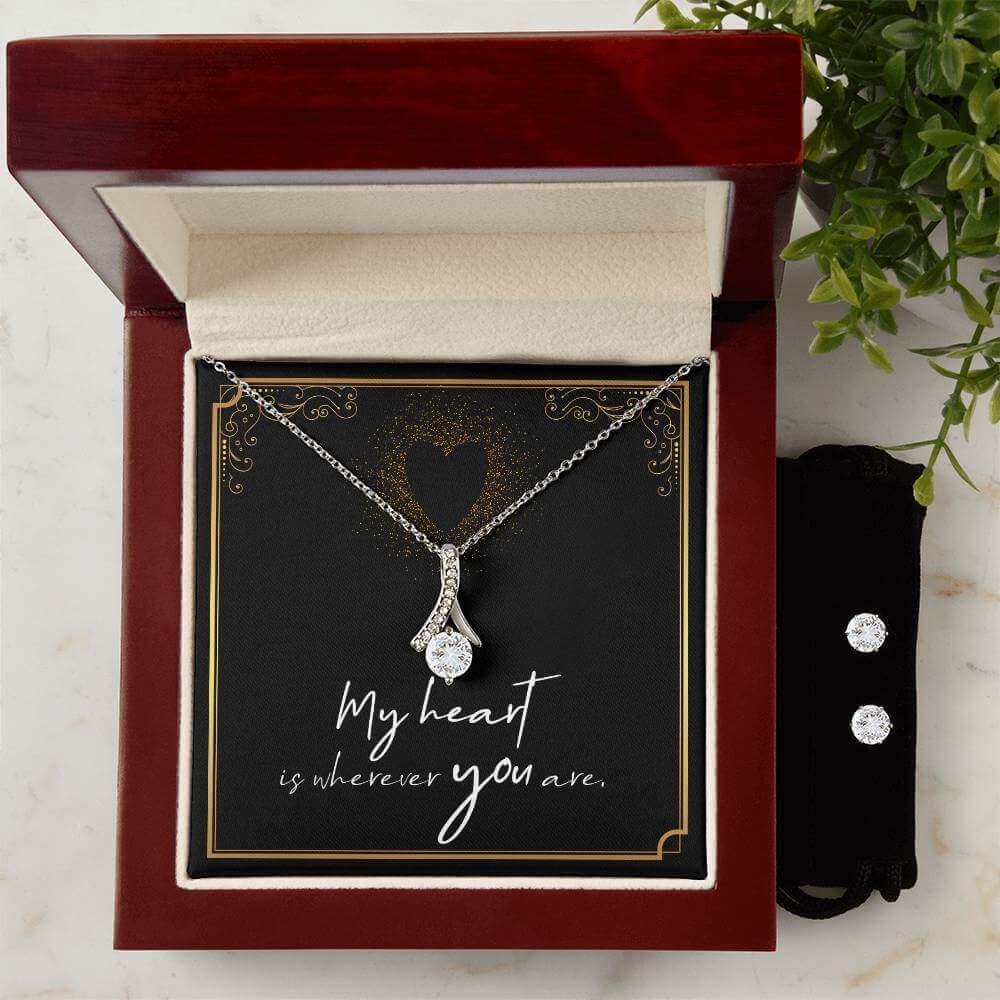 My Heart is wherever you are - Alluring Beauty Jewelry SetThis message card says: My Heart is wherever you are. Imagine her reaction when your loved one opens this stunning gift! The Alluring Beauty Necklace and Cubic Zirconia Earring Set is a sweet treat