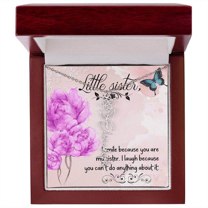 I Smile Because You - Flower Name NecklaceThis message card says: I smile because you are my sister. I laugh because you can't do anything about it. Need a gift that's as unique as she is? Then look no further than our Flower Name Necklace! With a customi