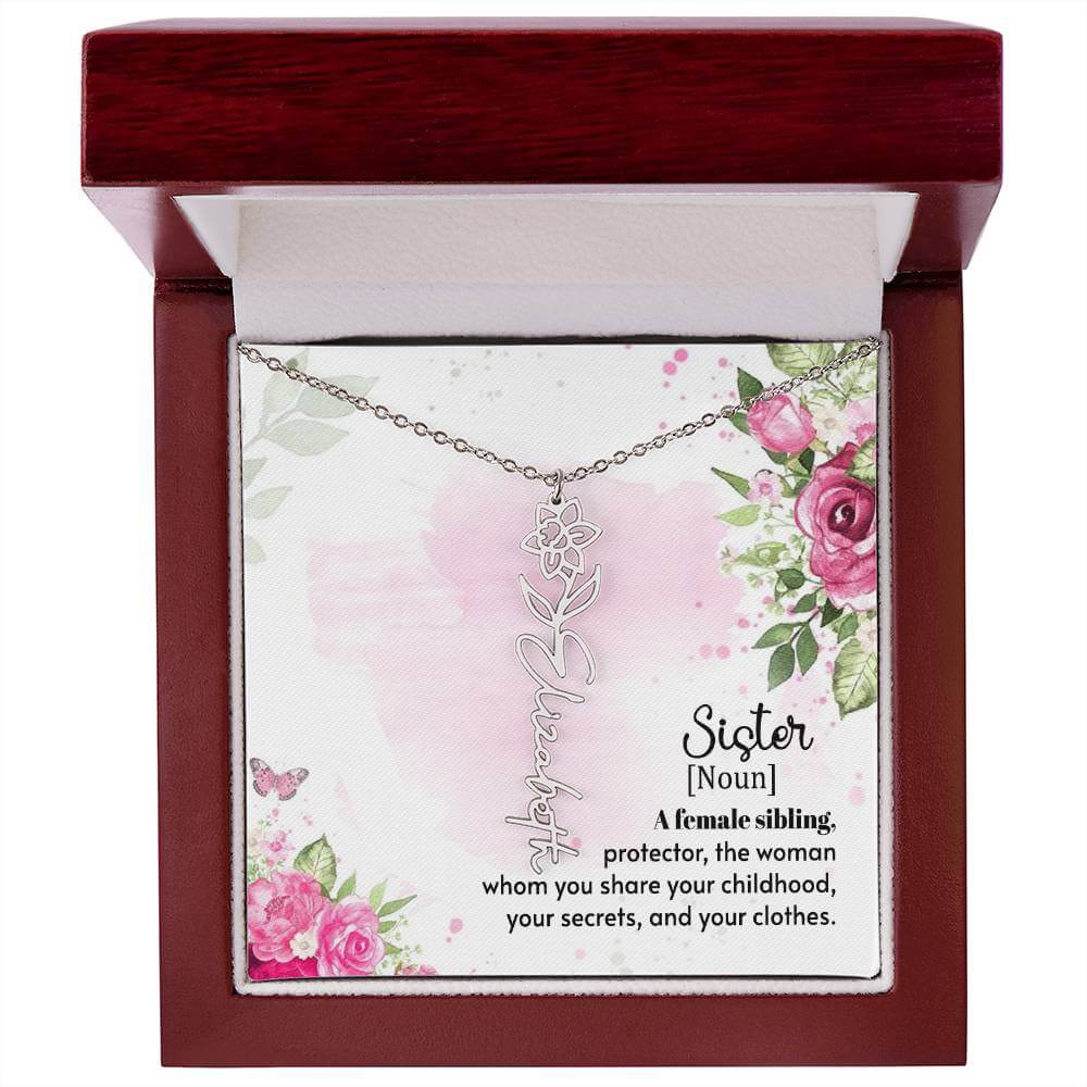 Sister - A female sibling - Flower Name NecklaceThis message card says: Sister (Noun) A female sibling, protector, the woman whom you share your childhood, your secrets and your clothes. Need a gift that's as unique as she is? Then look no further than ou