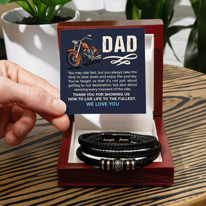 Dad, You May Ride Fast - Love You Forever BraceletThis message card says: Dad, You may ride fast, but you always take the time to slow down and enjoy the journey. You've taught us that it's not just about getting to our destination, but also about savorin