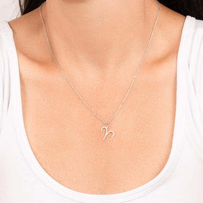 Aries Zodiac Symbol NecklaceImagine her smile when you give her this Zodiac Symbol Necklace. Handcrafted with care, this piece is made from durable stainless steel and optionally dipped in 18k yellow gold and features her unique astrological sign. This wo