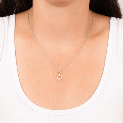 Taurus Zodiac Symbol NecklaceImagine her smile when you give her this Zodiac Symbol Necklace. Handcrafted with care, this piece is made from durable stainless steel and optionally dipped in 18k yellow gold and features her unique astrological sign. This w