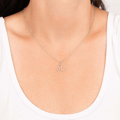 Leo Zodiac Symbol NecklaceImagine her smile when you give her this Zodiac Symbol Necklace. Handcrafted with care, this piece is made from durable stainless steel and optionally dipped in 18k yellow gold and features her unique astrological sign. This woul