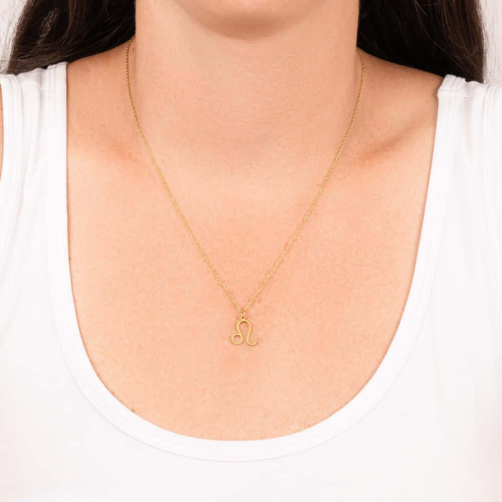 Leo Zodiac Symbol NecklaceImagine her smile when you give her this Zodiac Symbol Necklace. Handcrafted with care, this piece is made from durable stainless steel and optionally dipped in 18k yellow gold and features her unique astrological sign. This woul