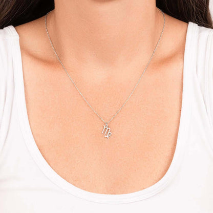 Virgo Zodiac Symbol NecklaceImagine her smile when you give her this Zodiac Symbol Necklace. Handcrafted with care, this piece is made from durable stainless steel and optionally dipped in 18k yellow gold and features her unique astrological sign. This wo