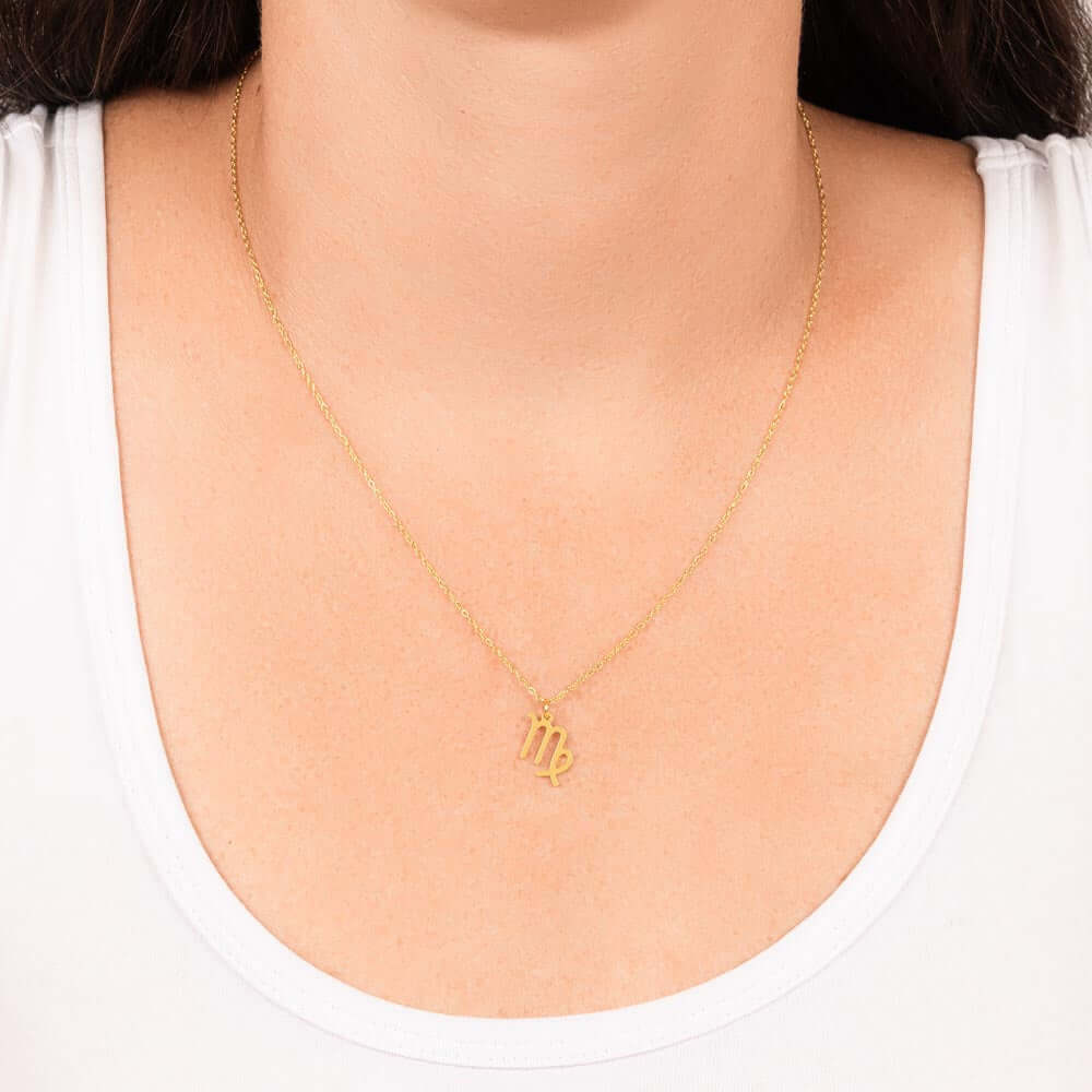 Virgo Zodiac Symbol NecklaceImagine her smile when you give her this Zodiac Symbol Necklace. Handcrafted with care, this piece is made from durable stainless steel and optionally dipped in 18k yellow gold and features her unique astrological sign. This wo