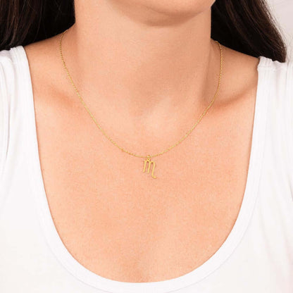 Scorpio Zodiac Symbol NecklaceImagine her smile when you give her this Zodiac Symbol Necklace. Handcrafted with care, this piece is made from durable stainless steel and optionally dipped in 18k yellow gold and features her unique astrological sign. This