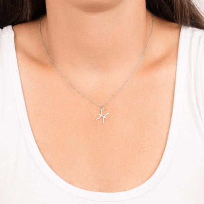 Pisces Zodiac Symbol NecklaceImagine her smile when you give her this Zodiac Symbol Necklace. Handcrafted with care, this piece is made from durable stainless steel and optionally dipped in 18k yellow gold and features her unique astrological sign. This w