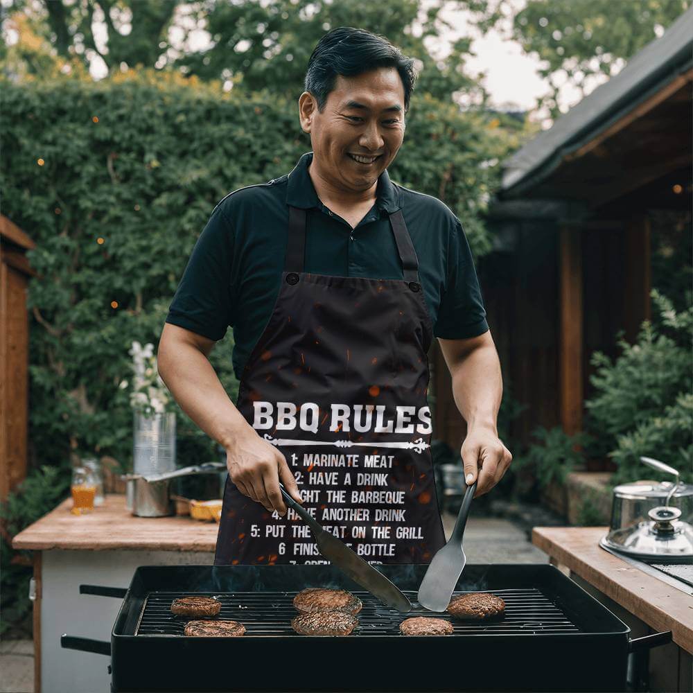 BBQ Rules - Apron for the cook in your lifeElevate your kitchen style with our premium, versatile apron. Personalize it as a perfect gift for cooking enthusiasts.Moving Phrases