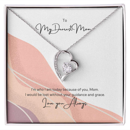 To My Dearest Mom, I am who I am - Love Knot Necklace"Mom, your guidance made me who I am. The Forever Love Necklace with a 6.5mm CZ crystal in a heart pendant is a symbol of my love."Moving Phrases