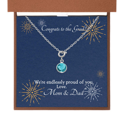 Congrats to the Grad - Birthstone NecklaceA minimalist birthstone necklace that incorporates the color of each birth month from Mom and Dad for graduation. Perfect gift for the perfect event.Moving Phrases